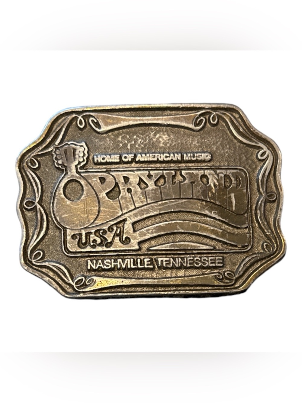 Vintage 1974 solid brass Opryland USA belt buckle made by Oden
